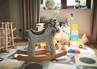 Rocking horse and other kids toys in a living room