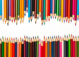 Many colorful pencils for children are brought together.