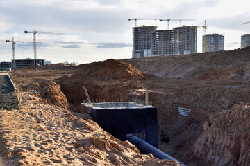 Construction of stormwater pits, sanitary sewer system distribution chamber and pump station....