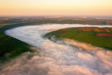 Morning fog over the river in the canyon.