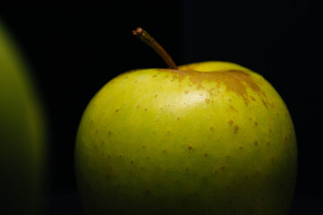 green apple on black