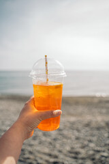 glass of orange juice or alcohol cocktail aperol spritz