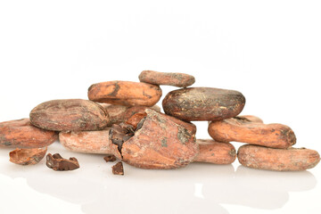 Organic, natural cocoa beans, close-up, on a white background.