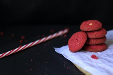 Red Velvet Cookies on a butter paper with dark background