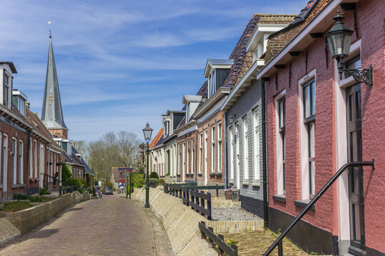 Colorful traditional houses in the small village Holwerd, Netherlands