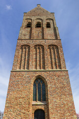 Fototapeta na wymiar Tower of the historic church of Ferwert, Netherlands