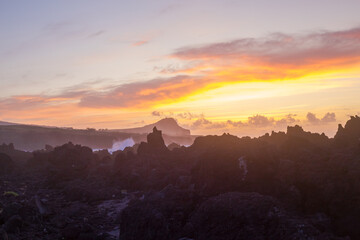 Fototapeta premium Lava stones on the beach of Piscinas Naturais Biscoitos. Atlantic Ocean. Terceira Azores, Portugal.
