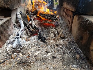 Logs burn in the fire