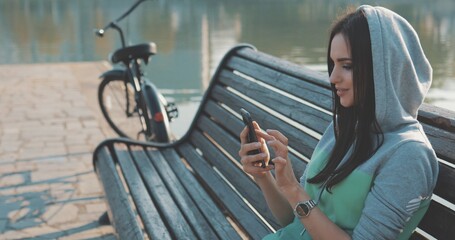 young hipster woman using smartphone