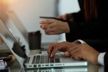 Fototapeta premium Businessmen working at the finance and marketing analysis desk