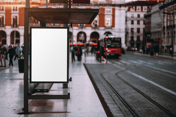 A blank advertising billboard placeholder template on the city street; an empty mock-up of an...