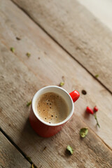 cup of coffee on wooden table