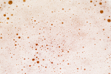 beer with foam and bubbles background