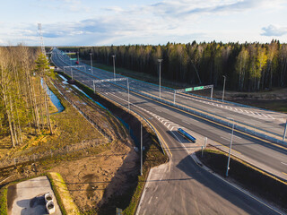 Aerial view of Moscow - Saint Petersburg motorway toll road, Russian federal highway in the European part of Russia, parallel to the M10 highway, from the federal cities of Moscow to St. Petersburg.