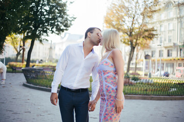 Fototapeta premium Beautiful couple in love dating outdoors and smiling
