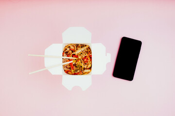 Chinese takeaways and mobile phone top view