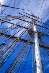 Obraz premium Old ship mast and sail ropes closeup