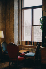 Vintage interior with old window, armchairs, and lamp, film photography - 353650809