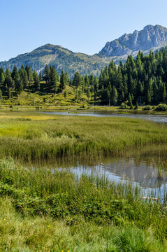 Panoramic view of the Julian Alps in summer, seen from passo Pramollo on the border between Italy and Austria. Mountain Landscape.