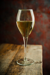 White wine on the rustic background. Selective focus. Shallow depth of field.