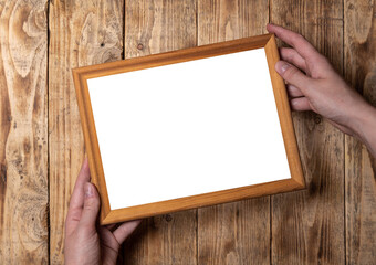 Mockup of photo frames on a wooden background