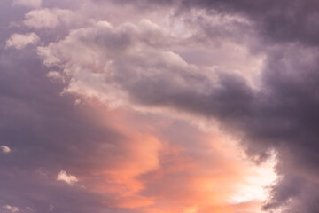 Naklejka na ściany i meble Sunset clouds orange and pastel color.