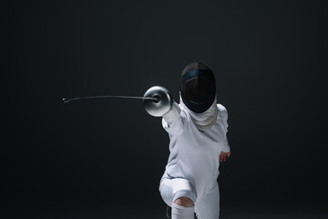 Fencer holding rapier while training isolated on black