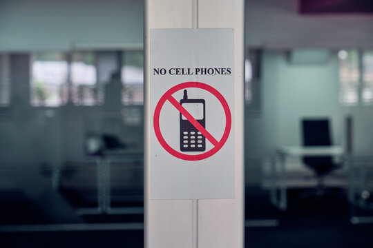 No cell phones sign in the office.