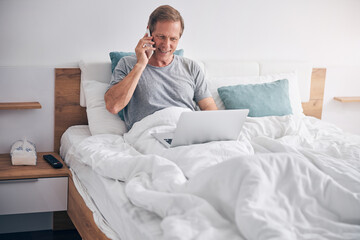 Fototapeta premium Busy mature male person talking on mobile phone