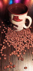 Coffee cup on roasted coffee beans.