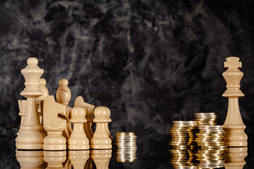 King on the coin on black background