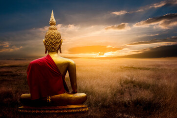 buddha statue in sunset