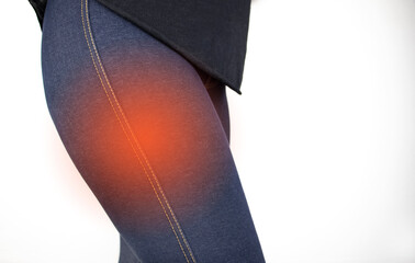 A woman suffers from pain in the outer thigh. The concept of treating a hip joint for trauma, plantation or osteoarthritis.