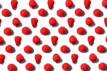 Pattern made of fresh raspberry isolated on white.