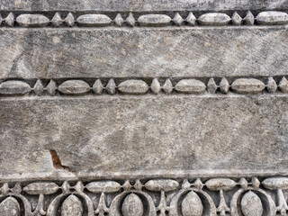 Fragment of grey marble background with pattern in the Ancient city of Perge near Antalya, Turkey