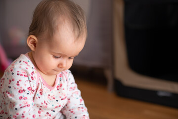 Sweet 1 year old baby girl portrait indoors