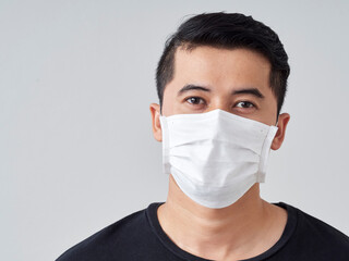 Young man in protective medical mask.