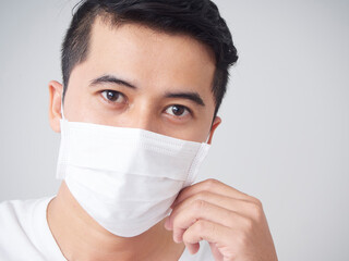 Young man in protective medical mask.