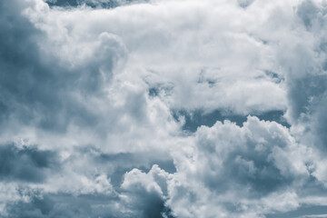 Light cumulus clouds in the blue sky. Toning Classic Blue