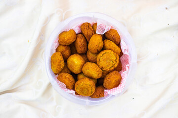 Fried homemade chickpea falafel balls in bowl. Vegan food.