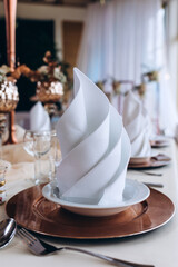 Banquet table setting and decoration. Cutlery on the table.