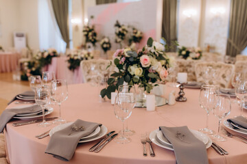 Banquet table setting and decoration. Cutlery on the table.