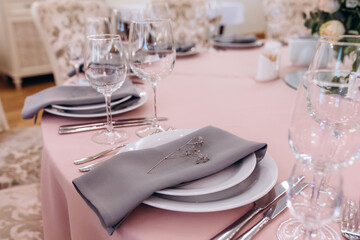 Banquet table setting and decoration. Cutlery on the table.