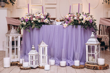 Wedding table for the newlyweds. Table setting and decorations.