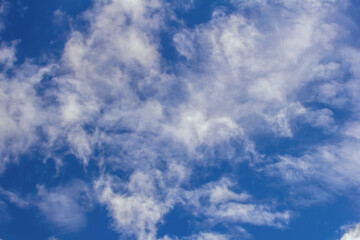 Obraz premium Light cumulus clouds in the blue sky