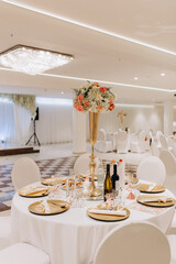 Banquet table setting and decoration. Cutlery on the table.