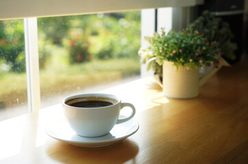 cup of coffee on a wooden table