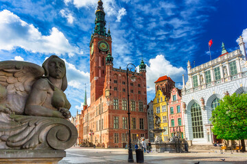 Beautiful architecture of the old town in Gdansk with city hall, Poland - obrazy, fototapety, plakaty