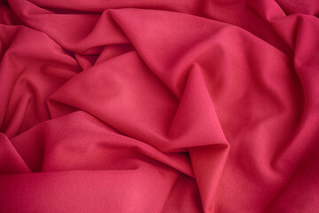 Red folded fabric texture background