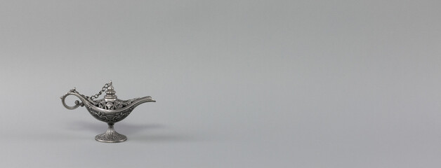 magic arabic lamp isolated on gray background